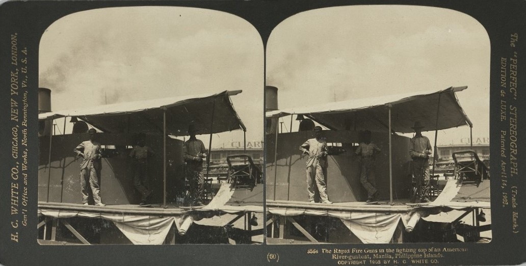 The Rapid Fire Guns in the fighting top of an American River-gunboat, Manila, Philippine Islands.